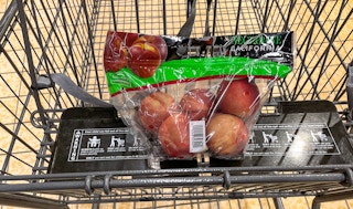 packaged nectarines in a cart at aldi