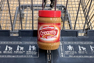 peanut butter in a cart at aldi 