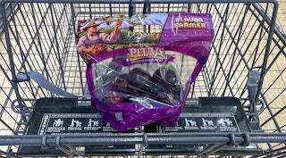 packaged plums in a cart at aldi