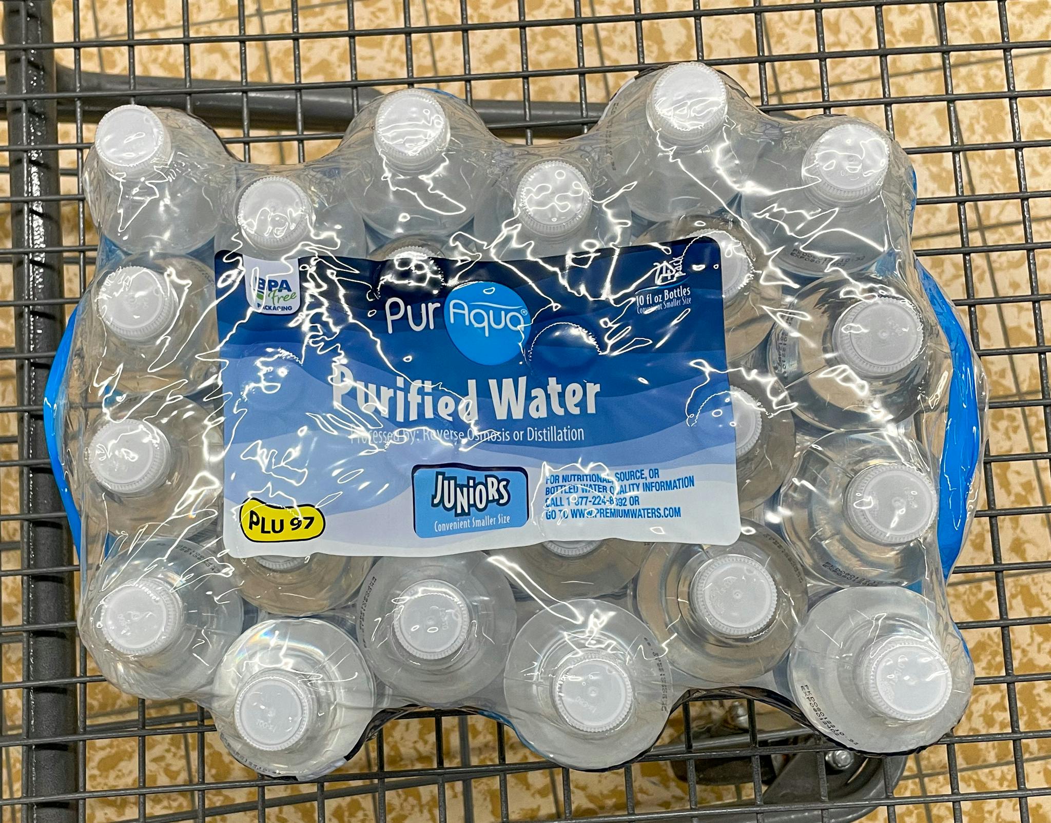case od water bottles in a cart at aldi