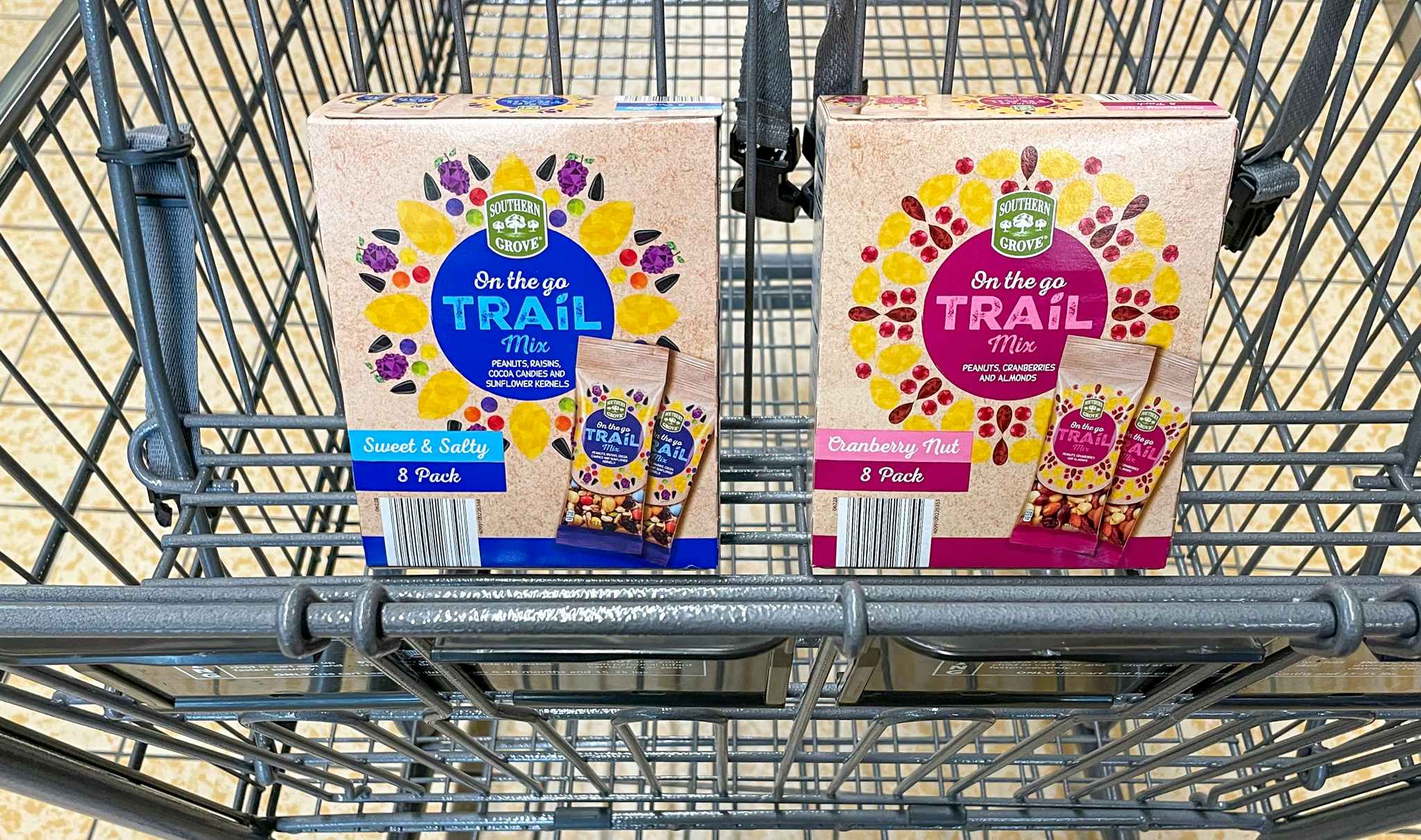 trail mix in boxes in a cart at aldi 