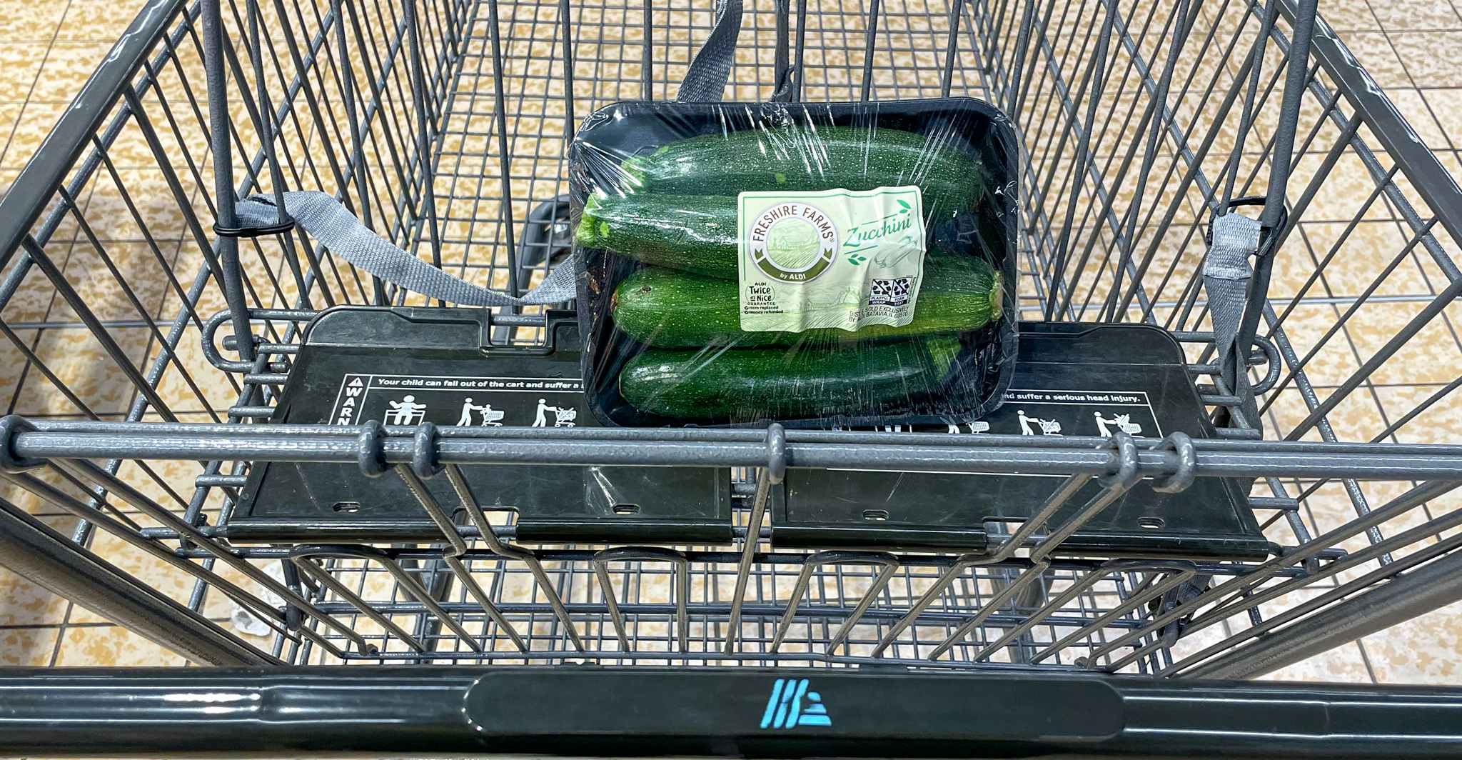 Zucchini in a cart at aldi