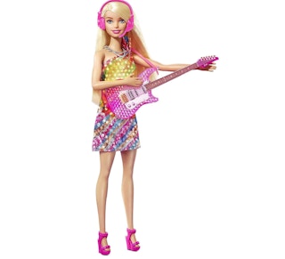 A Barbie with a guitar on a white background