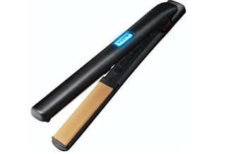 Black flat iron on a white background