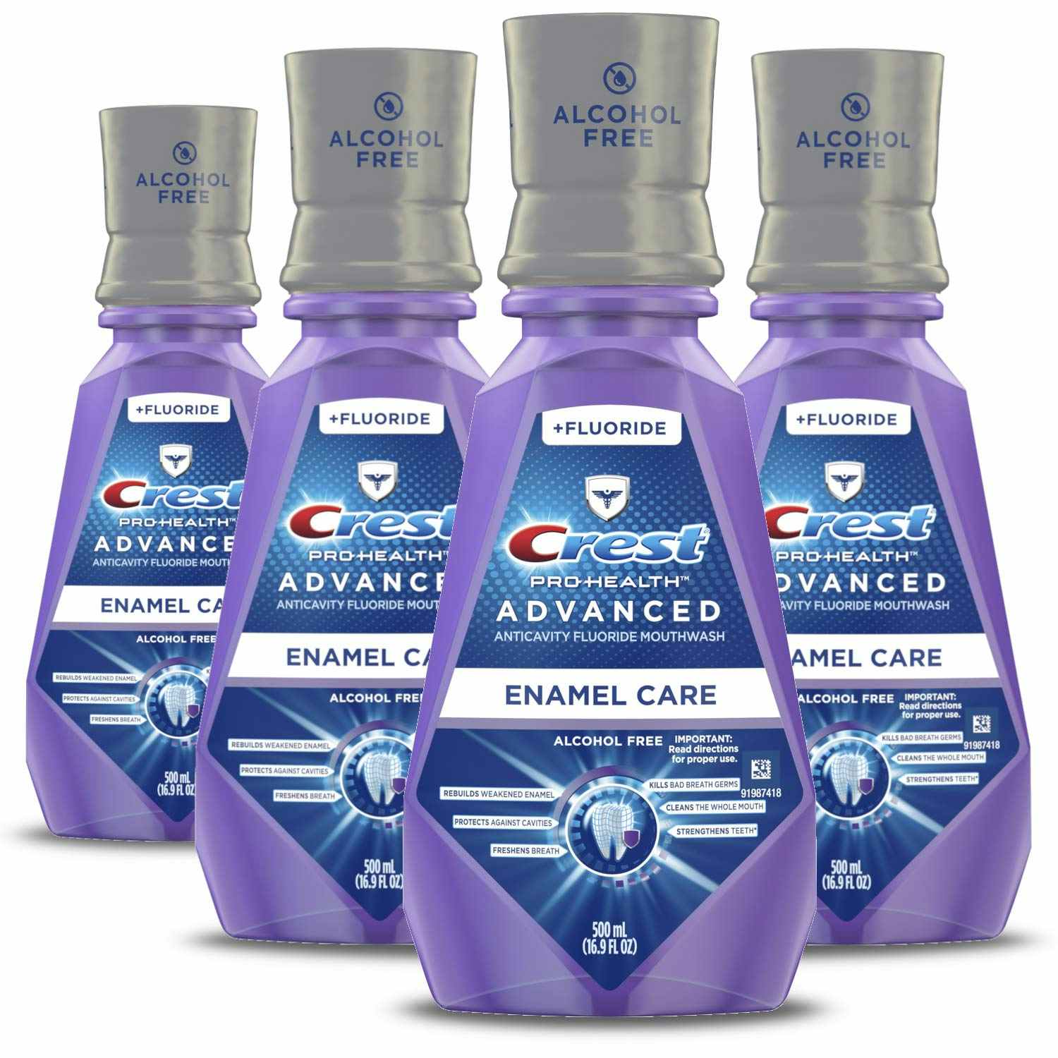 A pack of four Crest mouthwash bottles on a white background.
