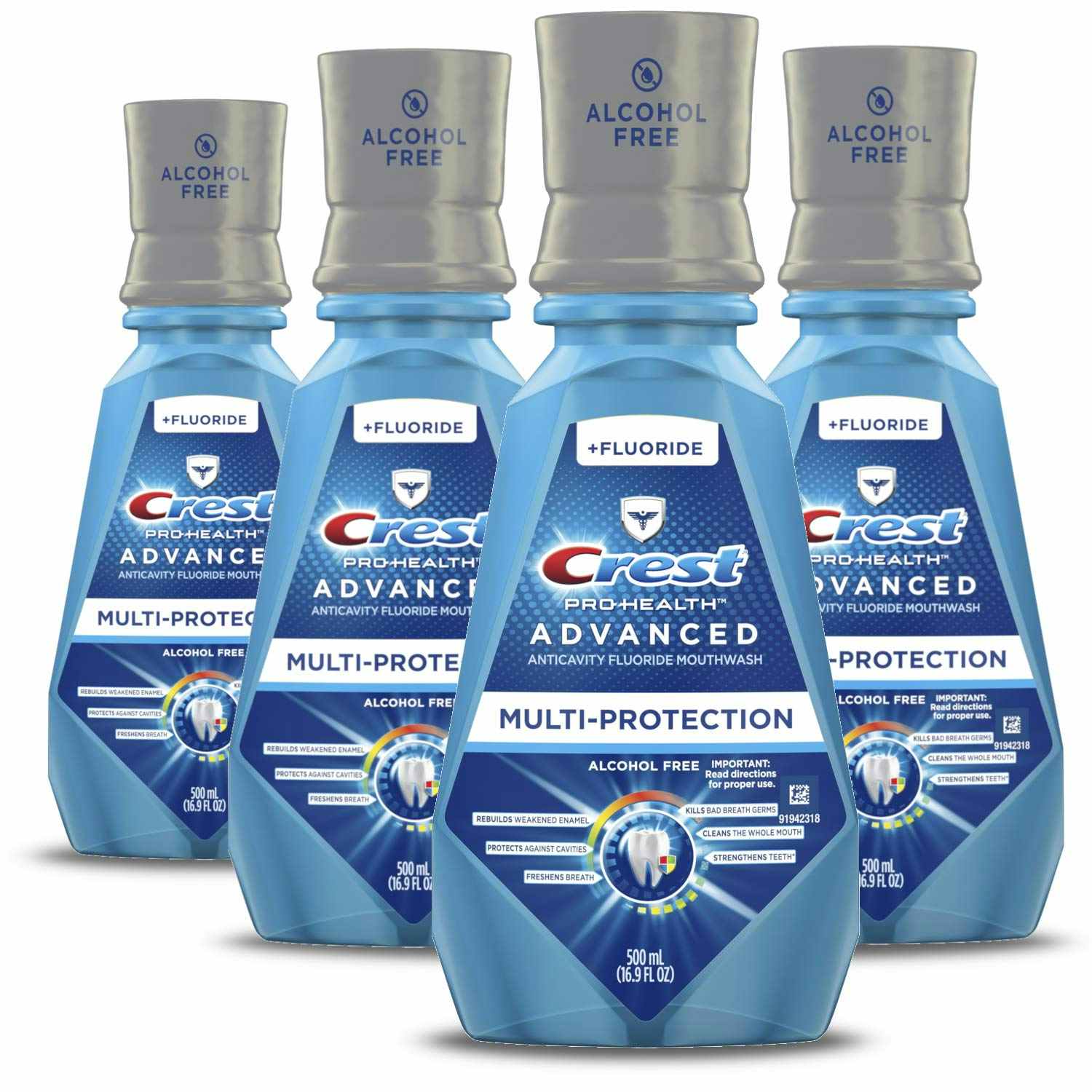 A set of four Crest mouthwash in front of a white background.