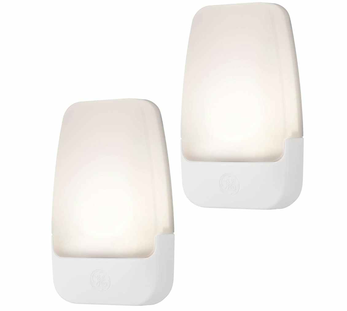 Two night lights on a white background