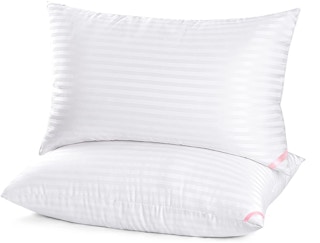 two packs of white pillows