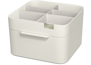 Beige makeup organizer on a white background