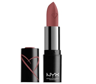 Mauve lipstick on a white background