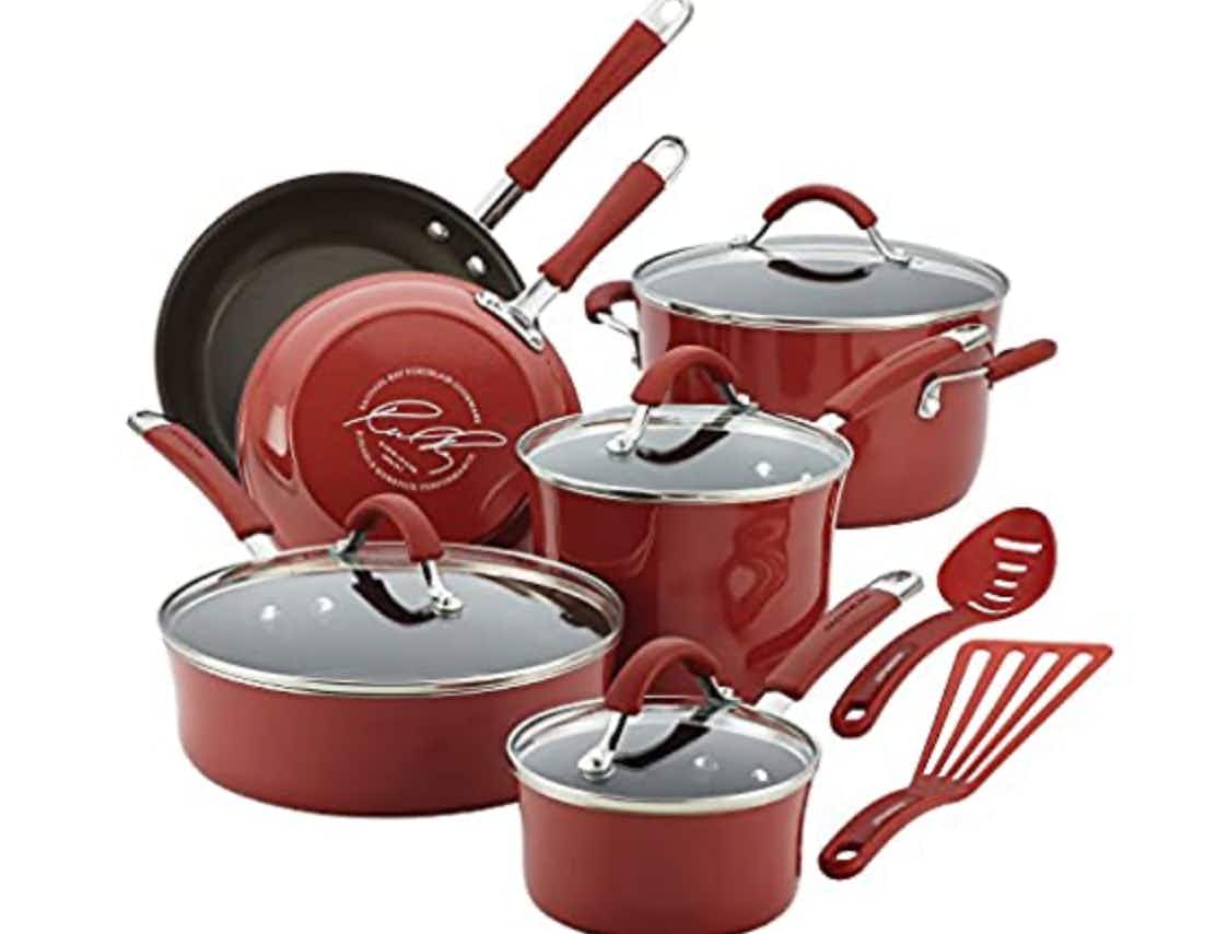 Red cookware set on a white background