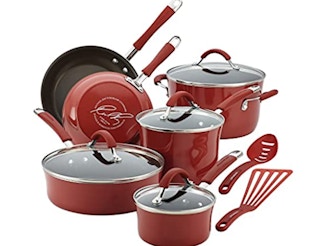 Red cookware set on a white background