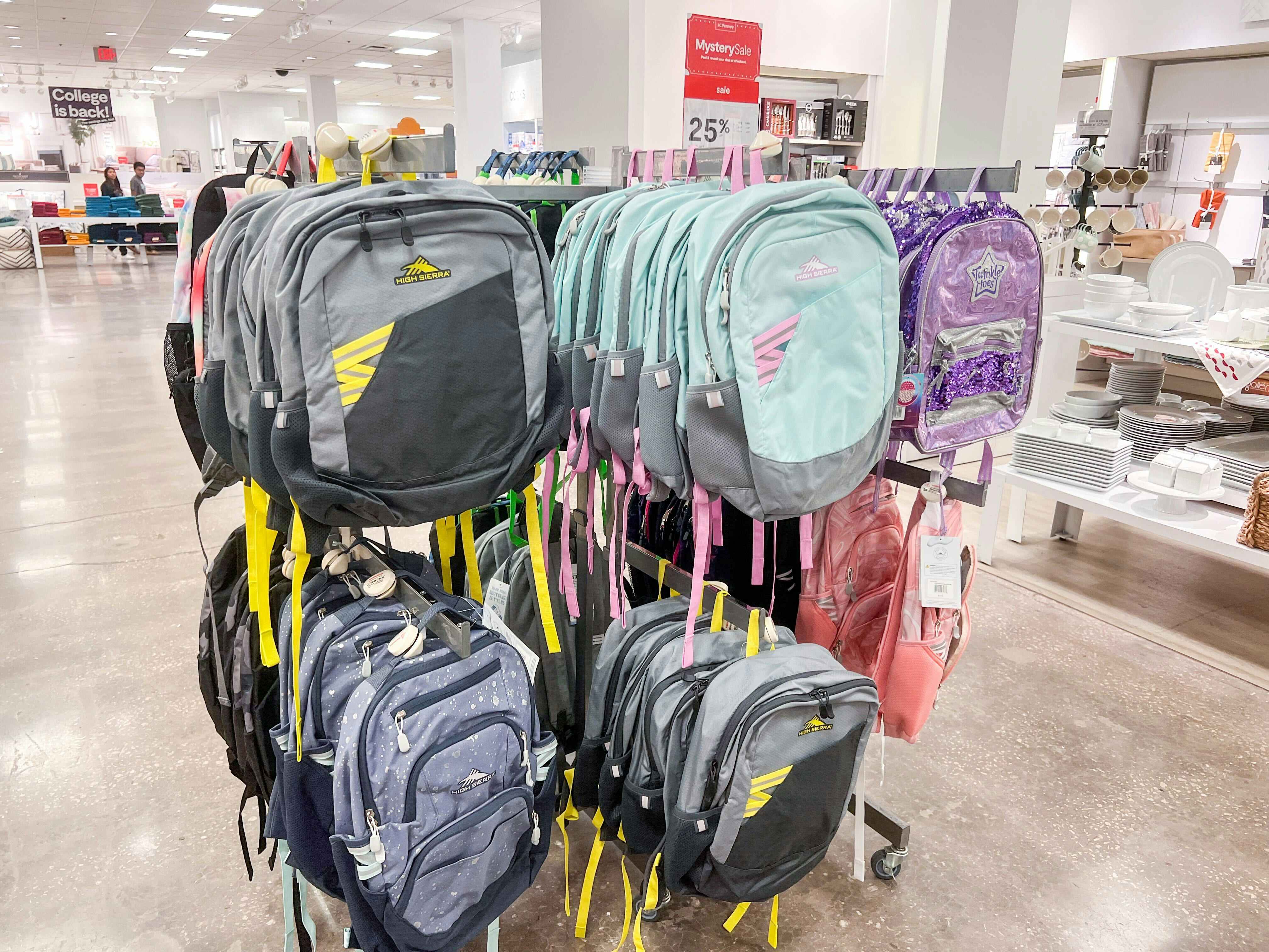display of kids backpacks on racks