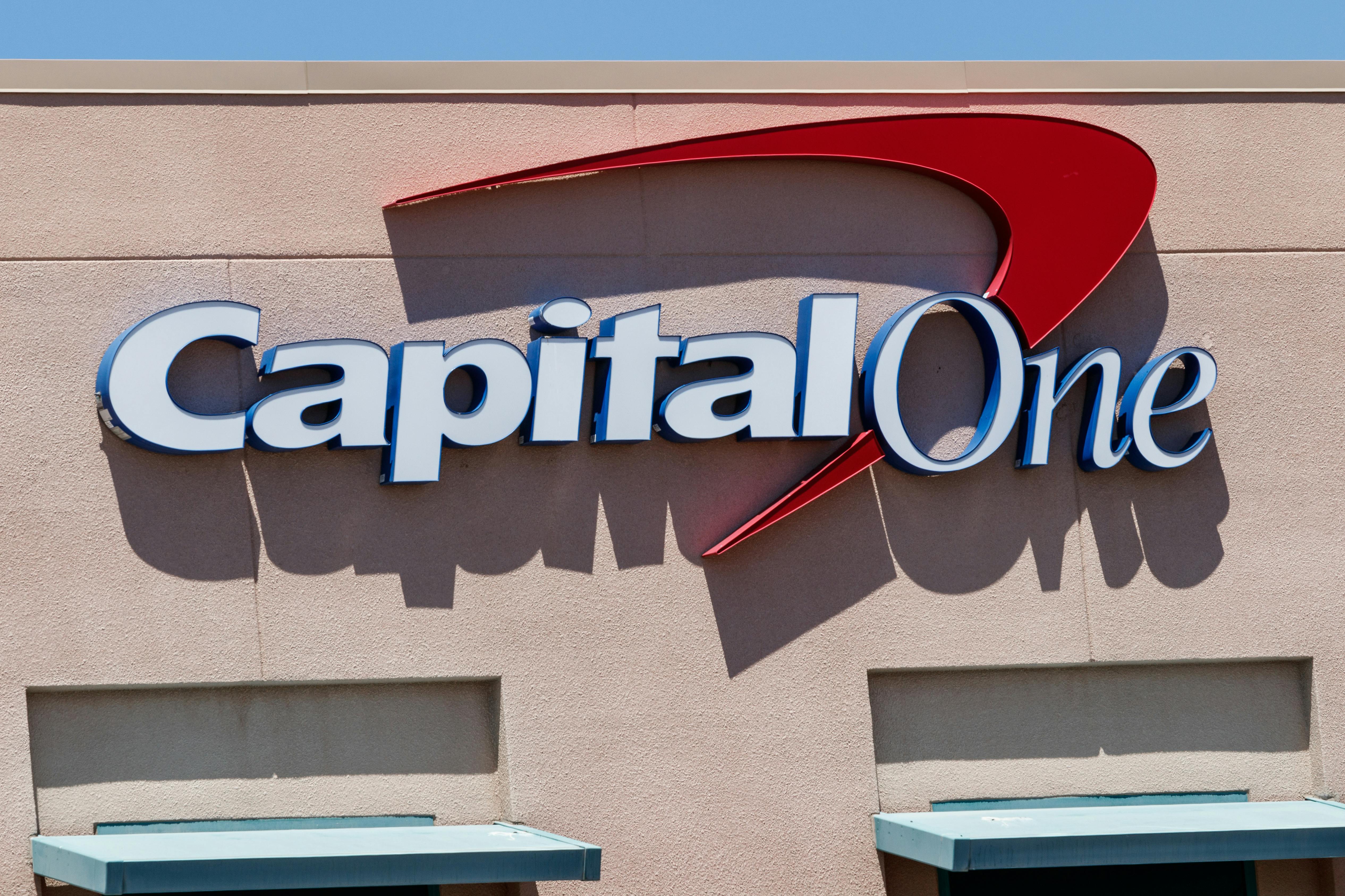 A Capital One sign on the outside of a building.