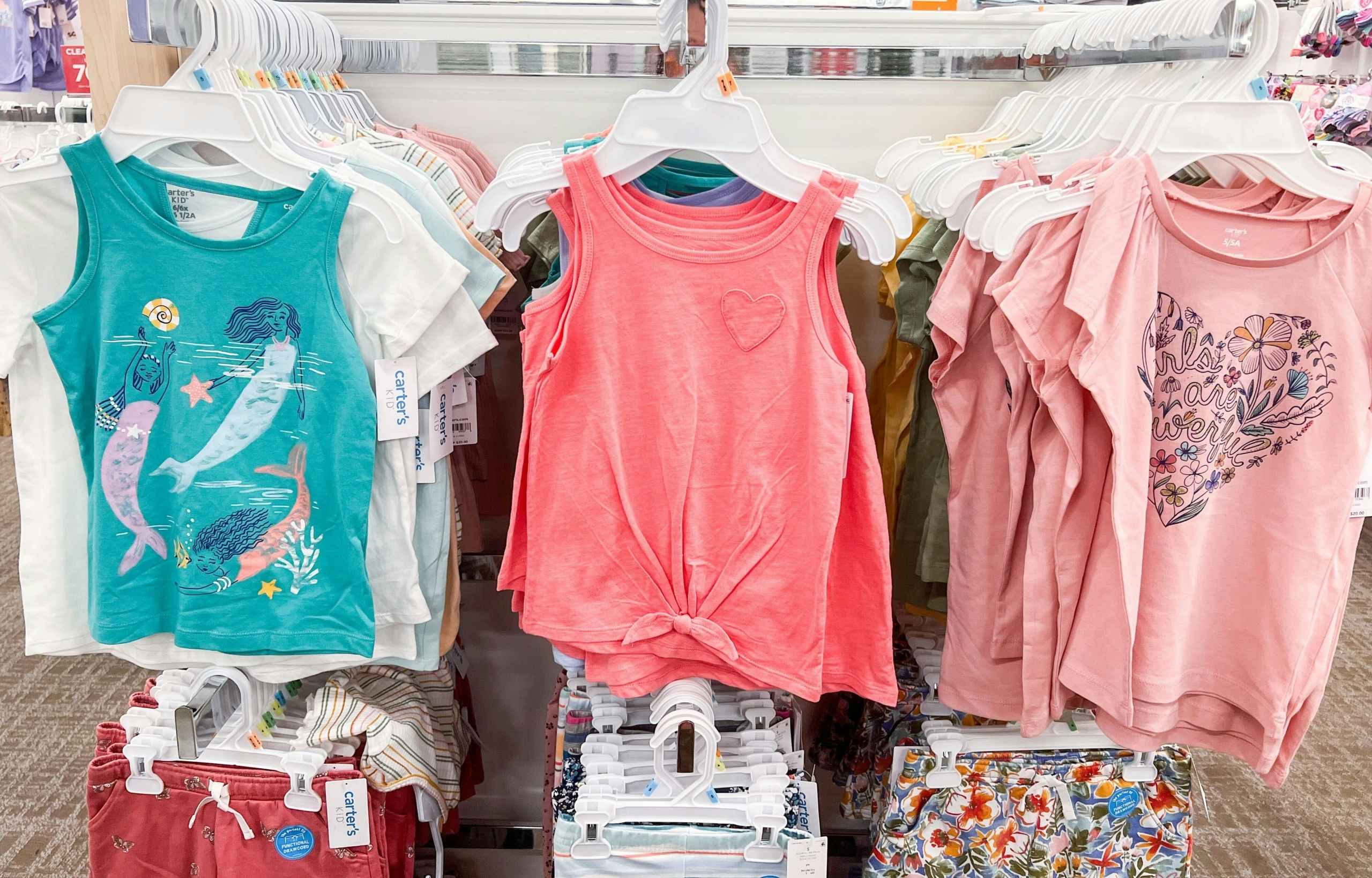 display of kids carters shirts