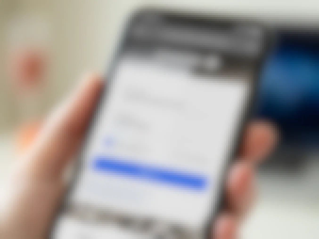 A close-up of someone holding an iPhone displaying the Chase Bank online banking log in screen with the username typed in as "DeadPresidentsClub