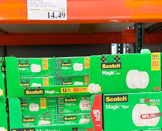 scotch tape on a self with sales sign at costco