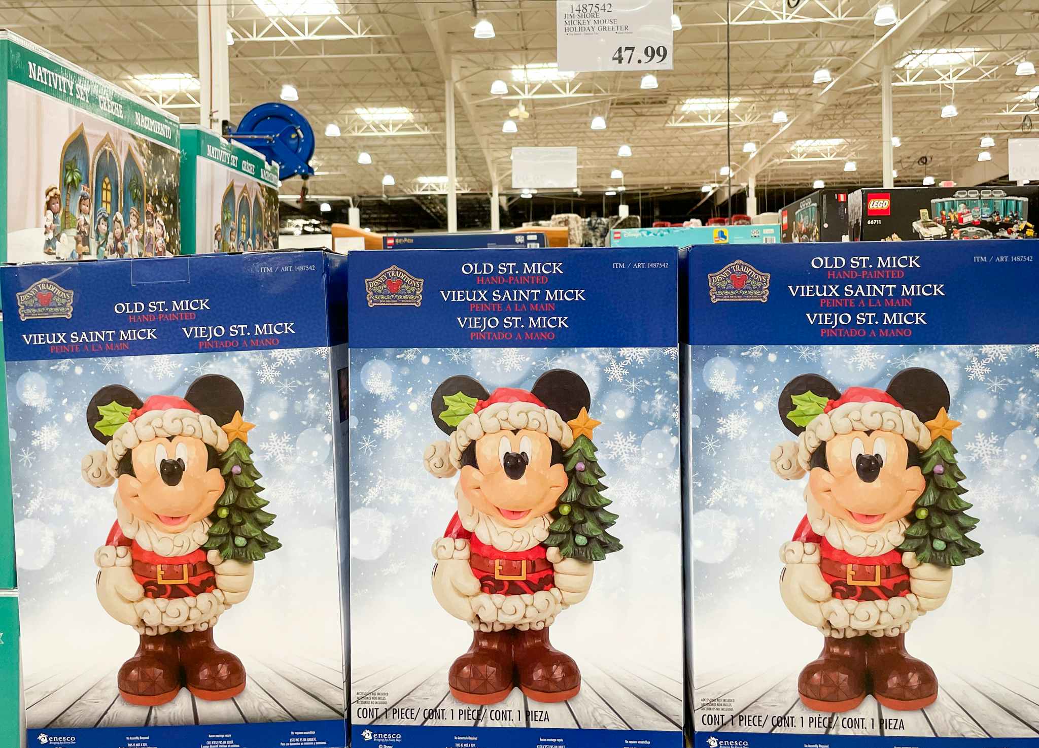 disney jim shore mickey mouse holiday greeter in boxes with sale sign at costco