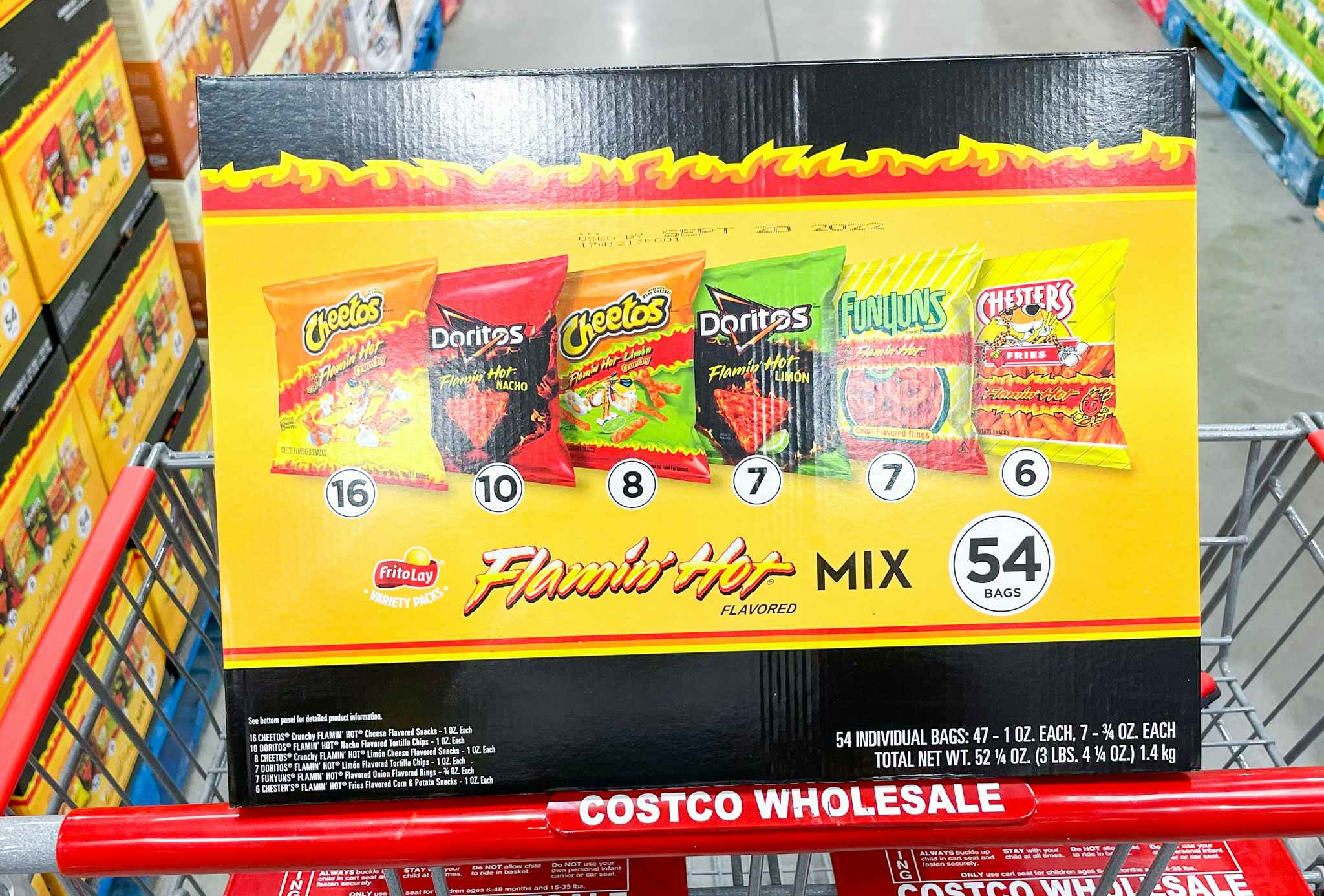 box of flamin hot variety chips in a cart at costco