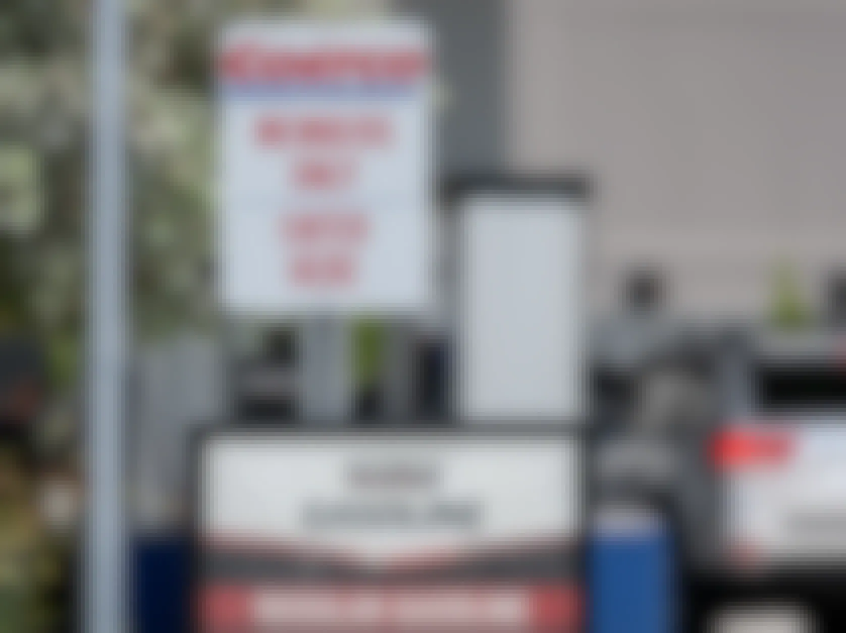A Costco Members Only sign at the entrance of the gas station.
