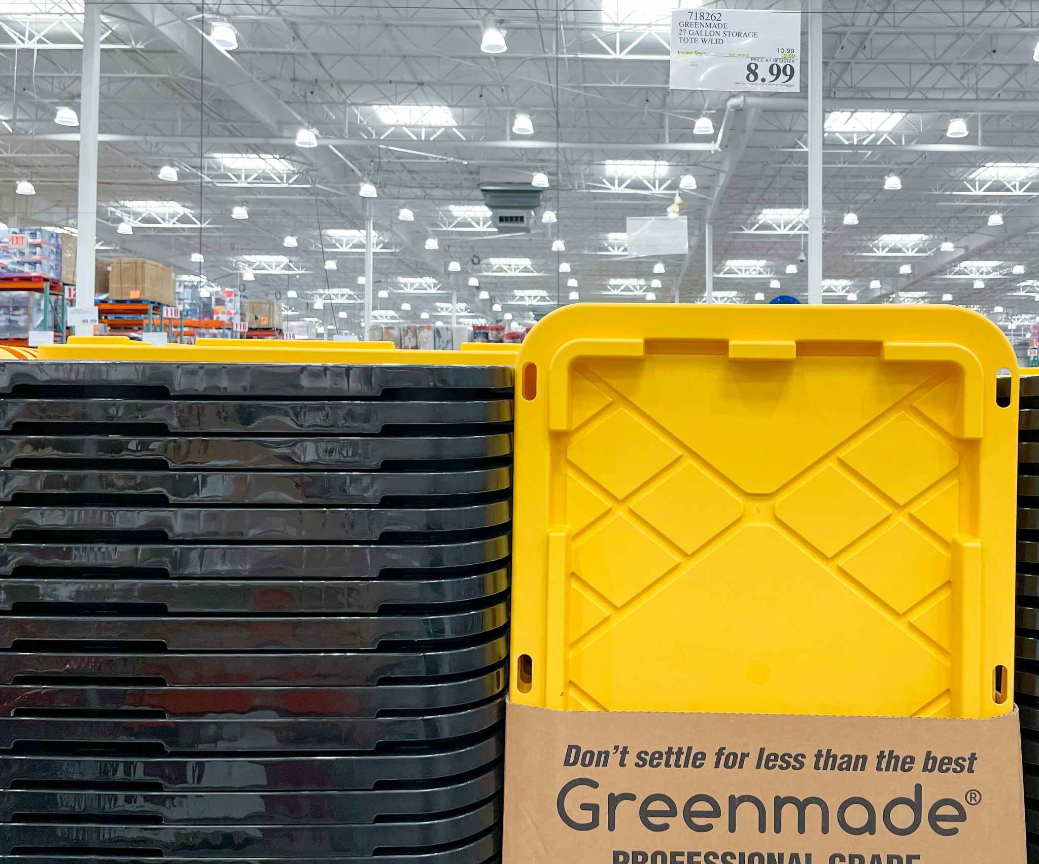 satcked storage bin with lid at costco with sale sign