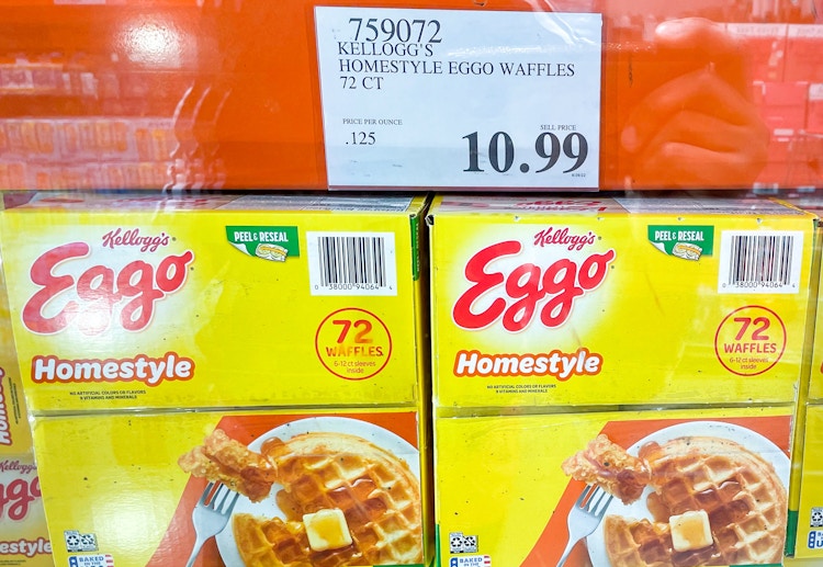 eggo waffles in boxes in a freezer with sale sign at costco