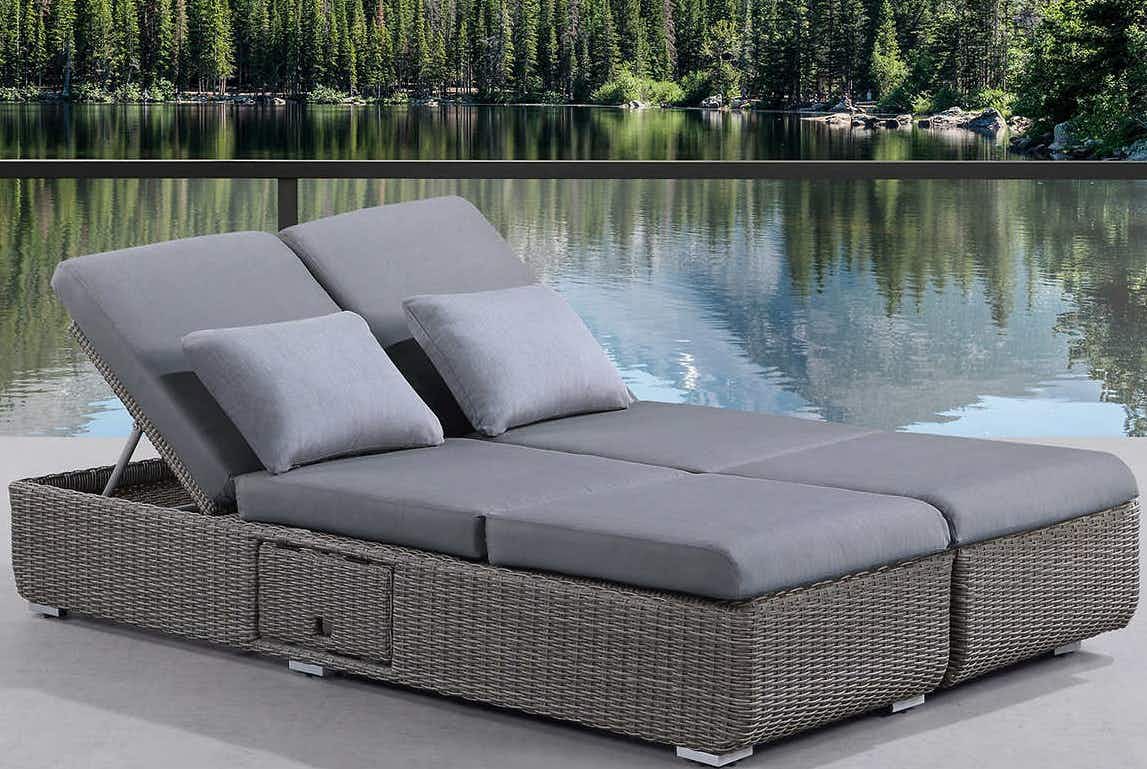 daybed near a lake outside 