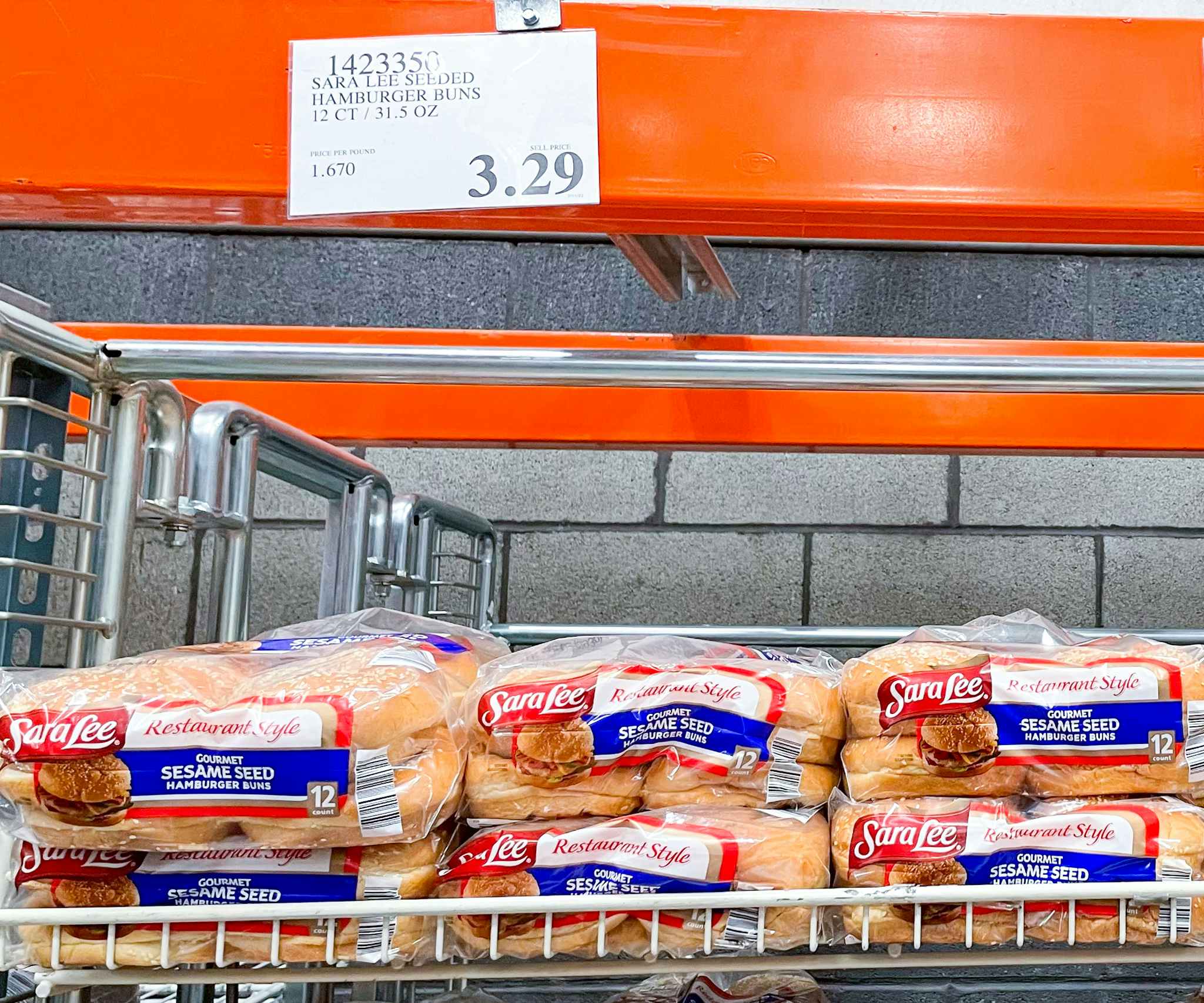 sara lee seeded hamburger buns on a shelf with sale sign at costco