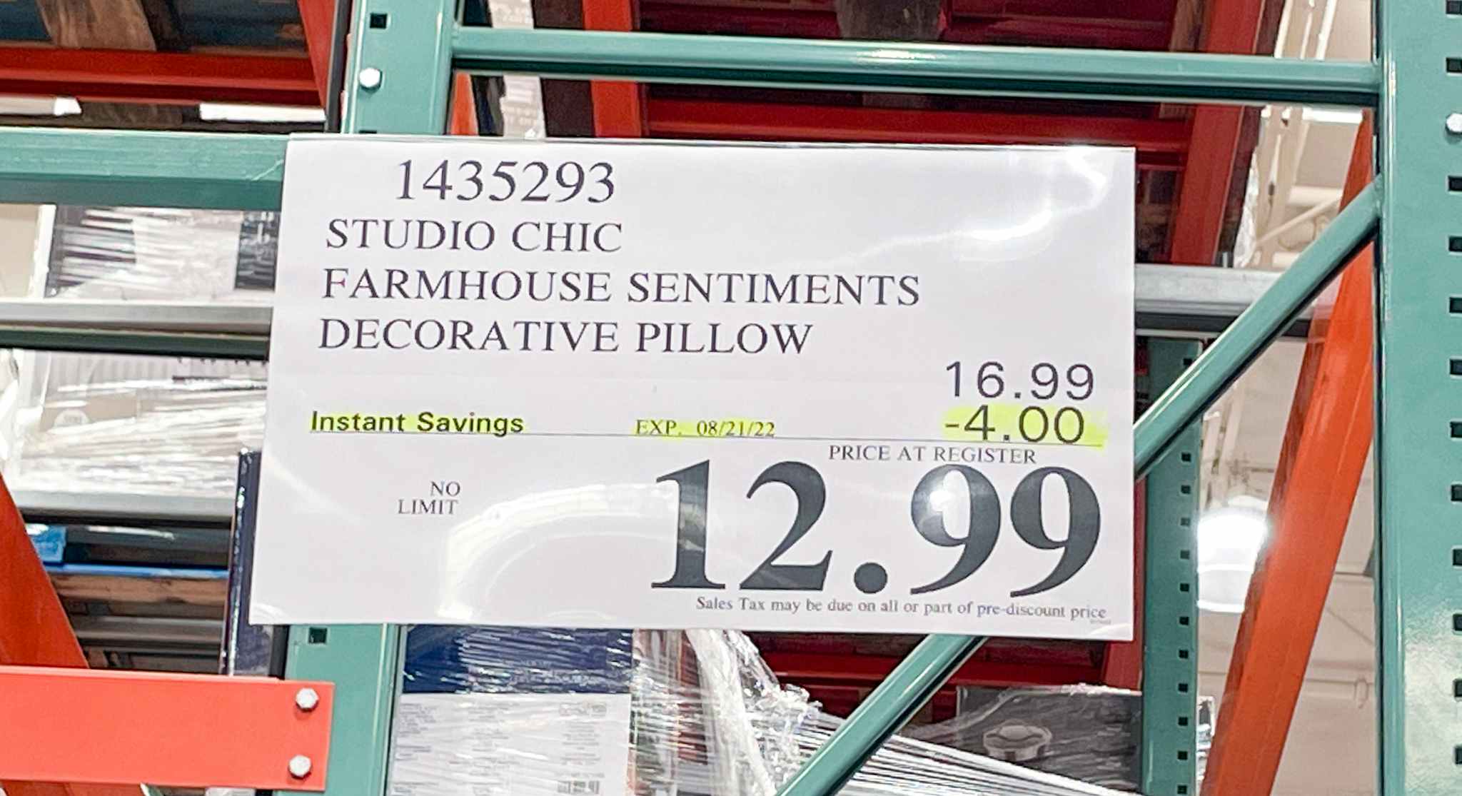 sale sign for pillows at costco