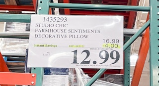 sale sign for pillows at costco