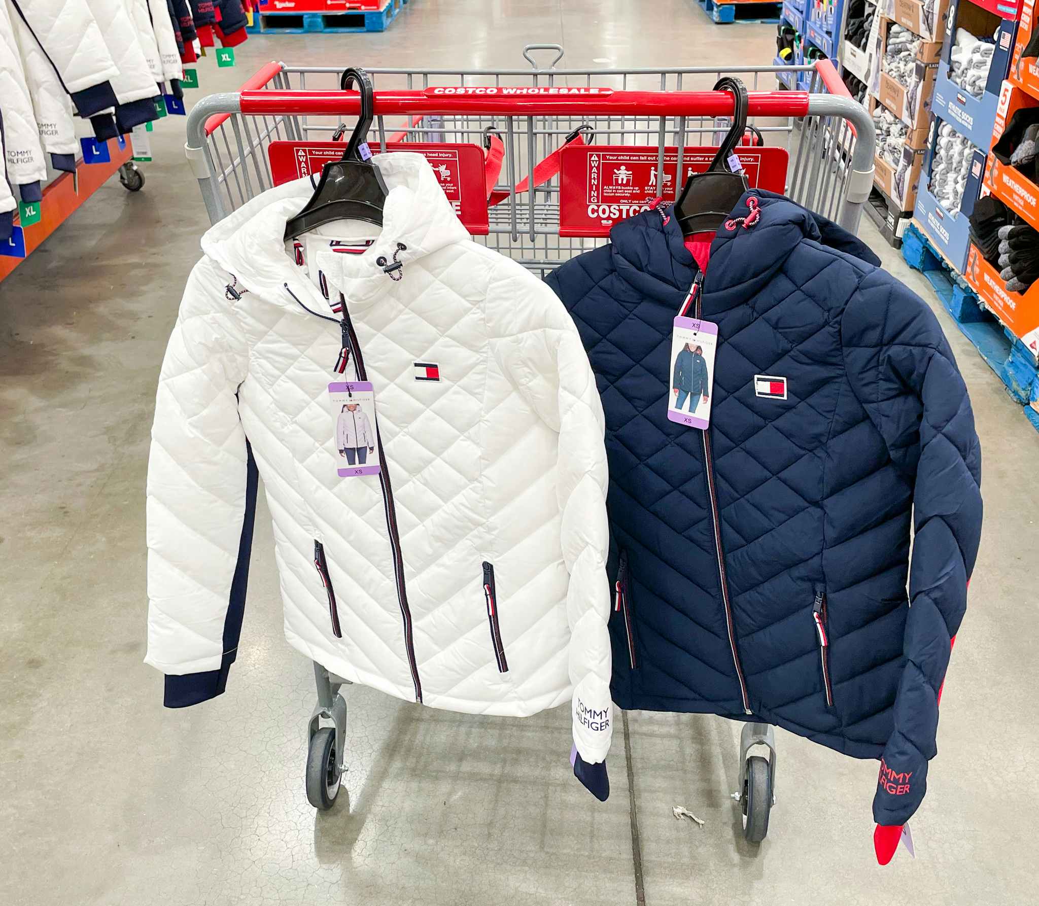 two jackets on a cart at costco