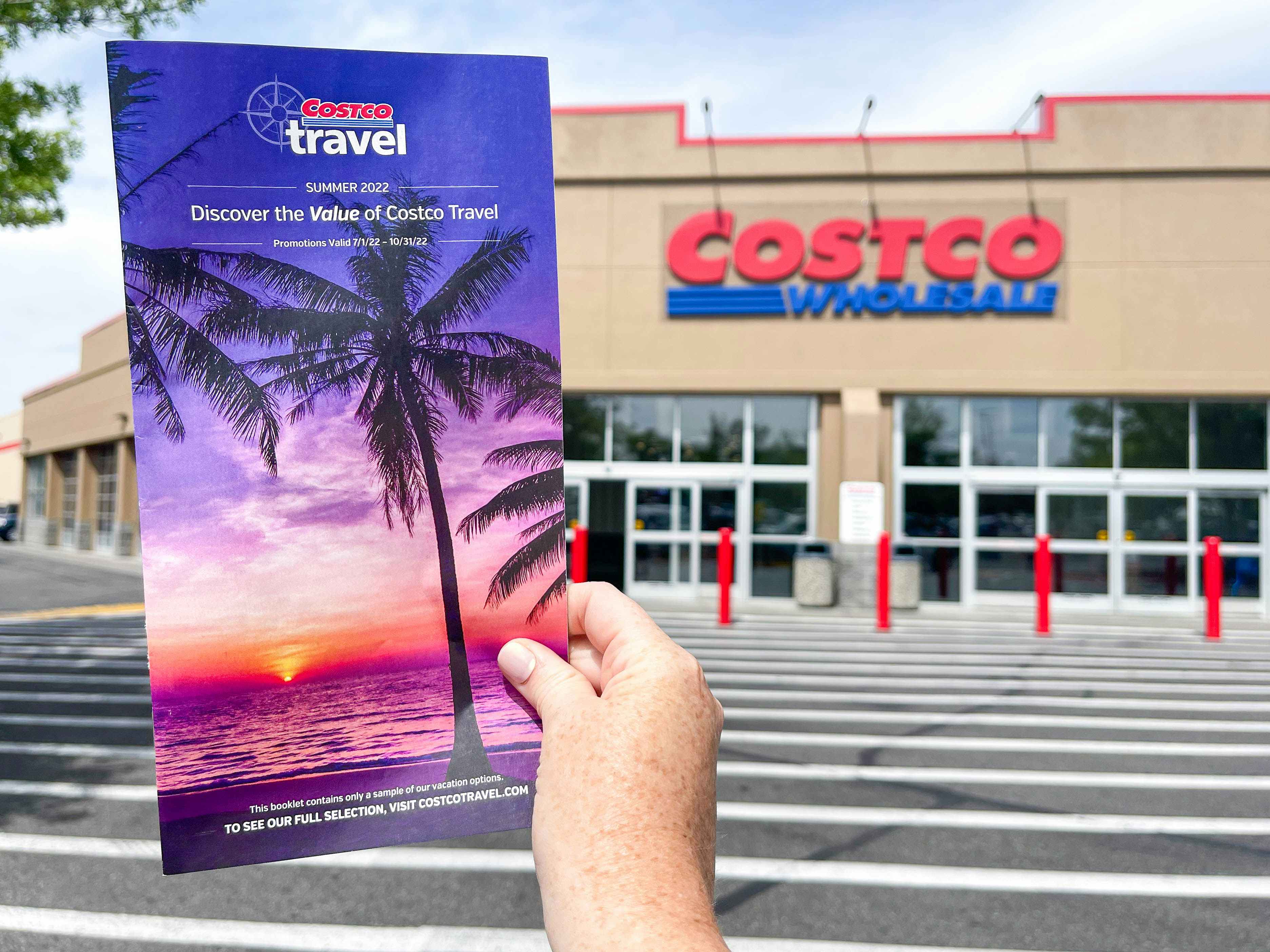 costco travel brochures on being held in front of store