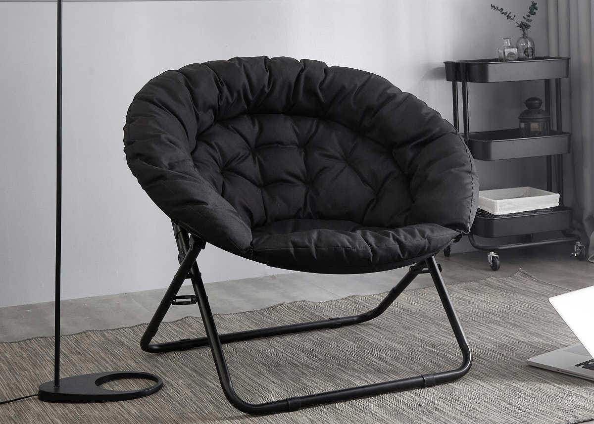 saucer chair in a living room 