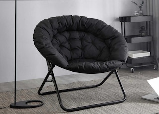 saucer chair in a living room