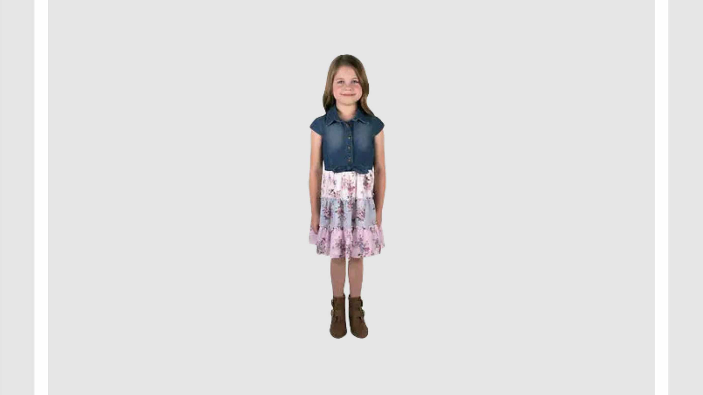 girl wearing a denim and pink dress