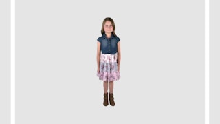 girl wearing a denim and pink dress