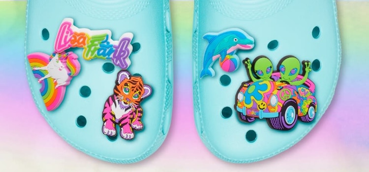 blue pair of crocs with lisa frank jibbitz