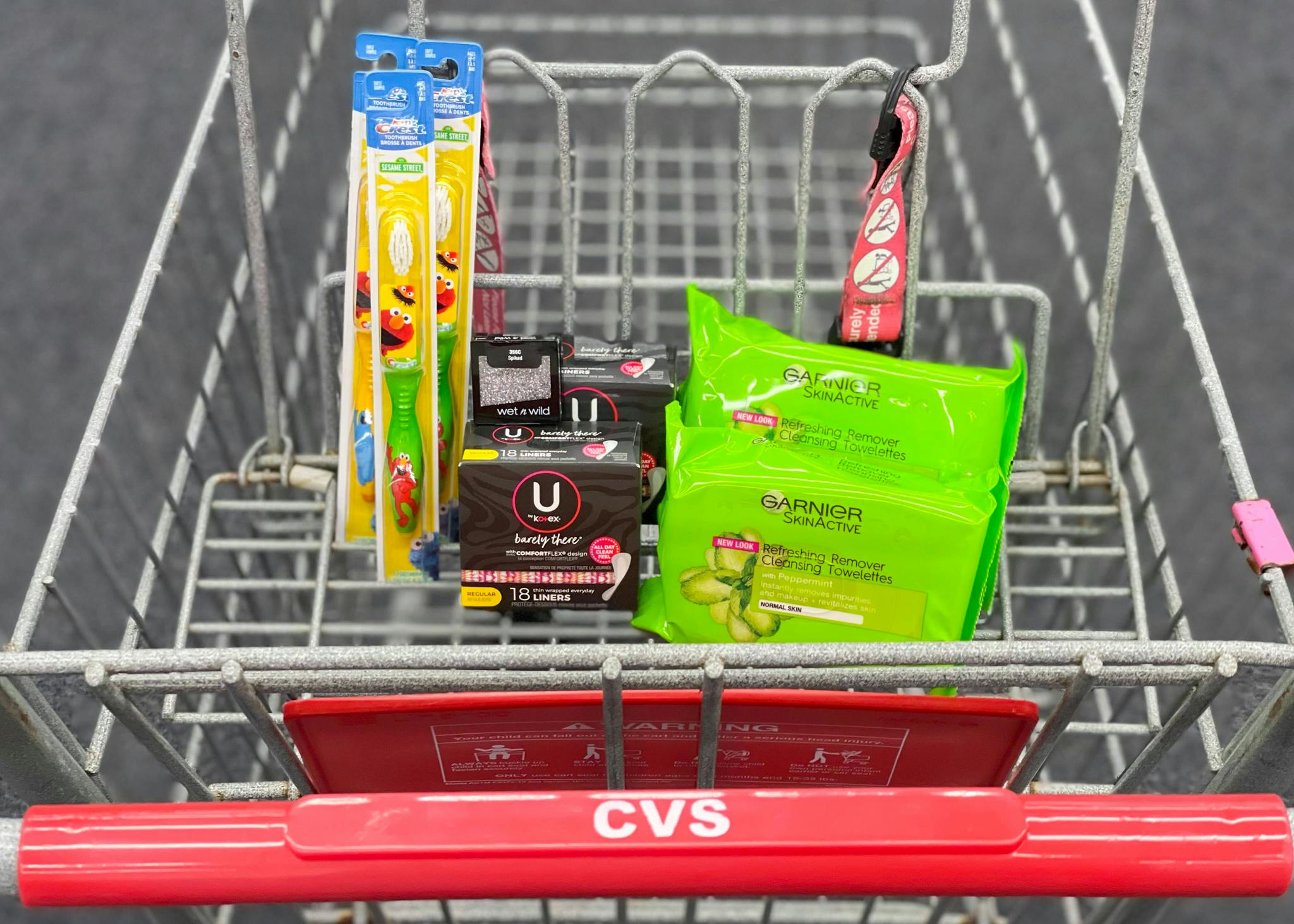 crest, kotex, wet n wild, and garnier in shopping cart