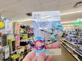 hand holding a pack of 2 disney frozen hair clips
