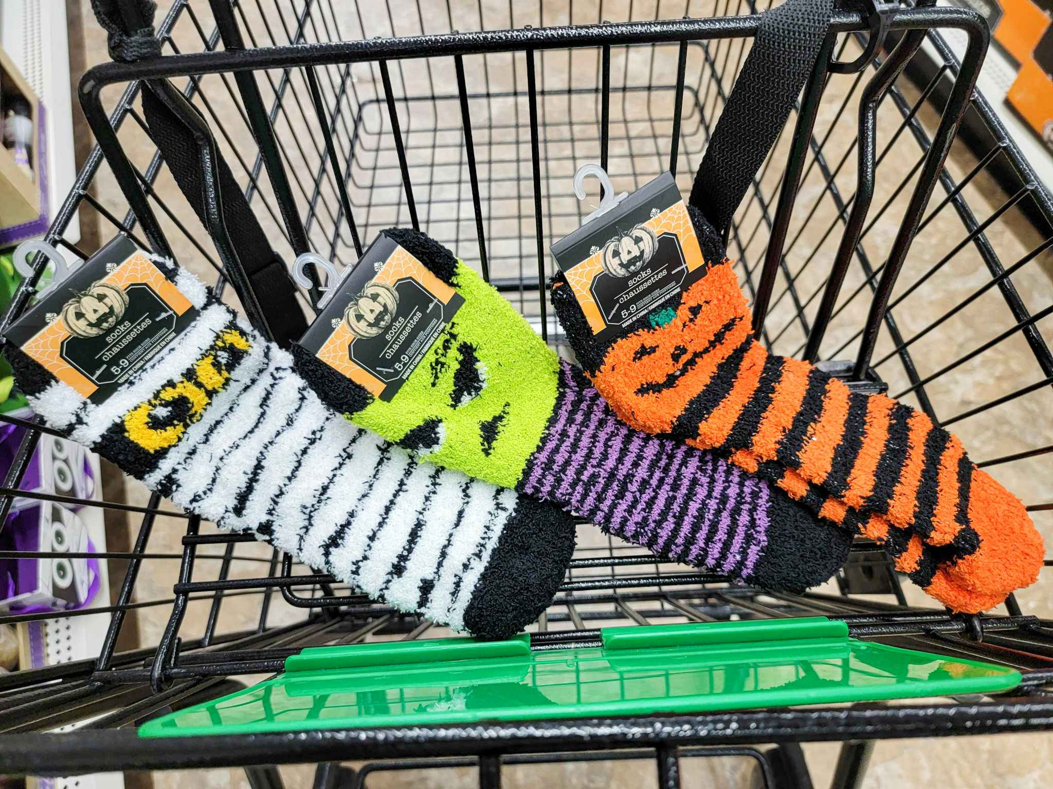 3 pairs of adult size fuzzy socks in a cart