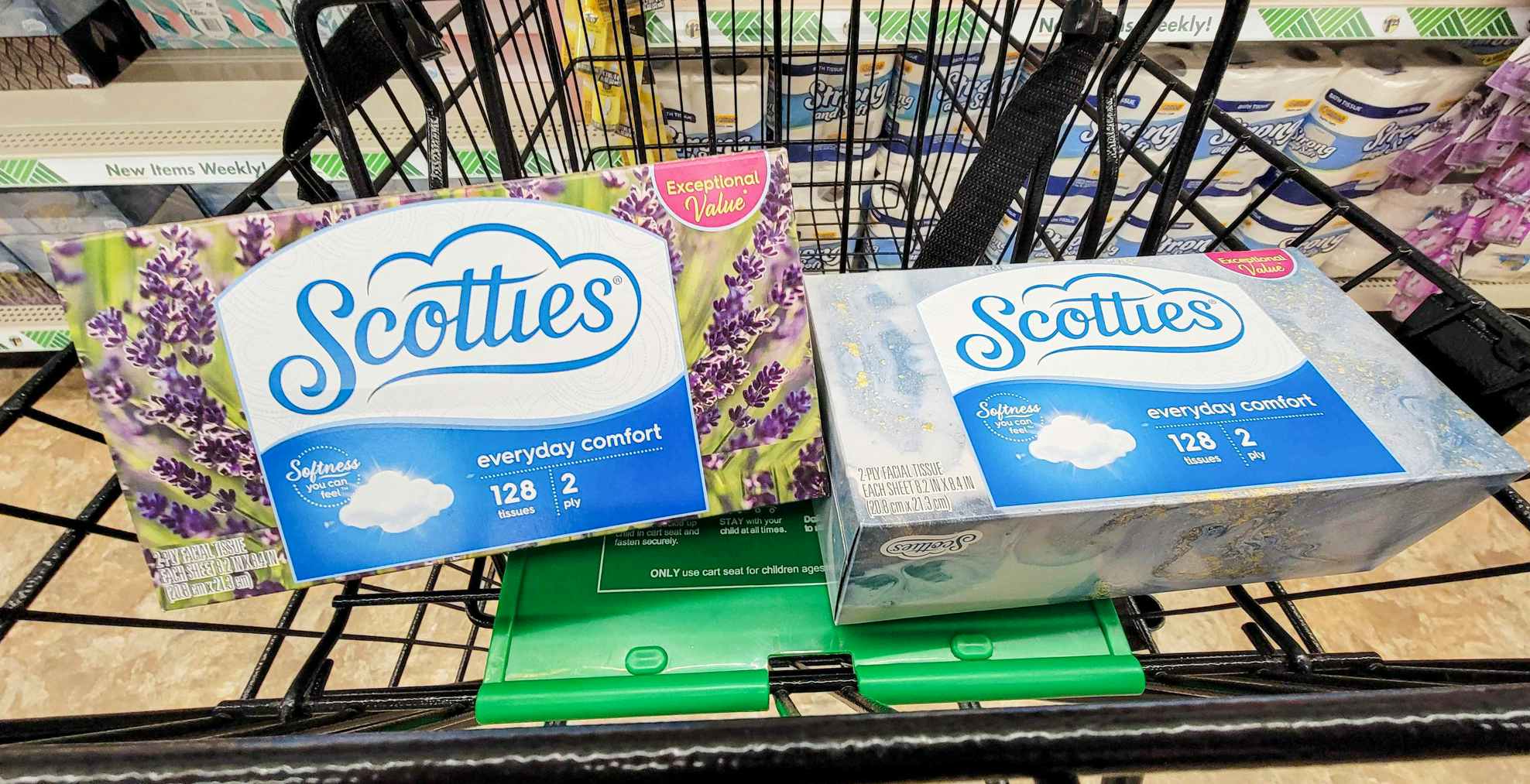 2 boxes of scotties tissues in a cart