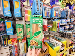 hand holding a pack of ticonderoga pencils