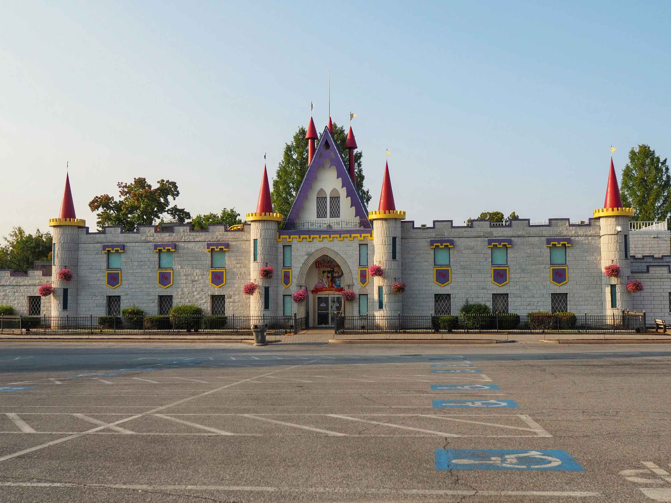 A Dutch Wonderland empty parking lot in front of the castle entrance.
