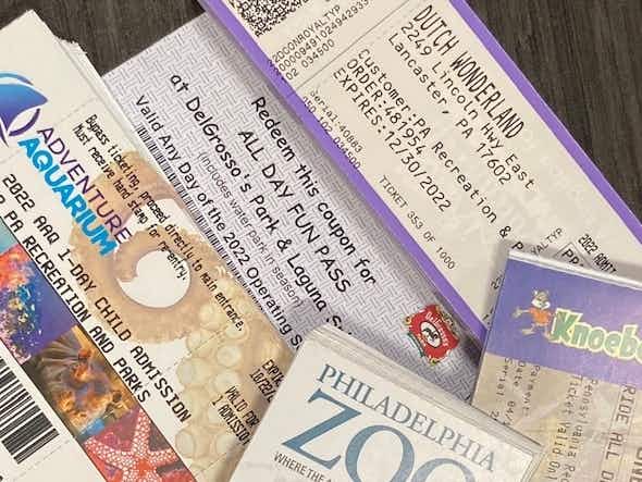 A pile of tickets for different things including Dutch Wonderland, purchased at a discount through the Eastern York Recreation Authority.