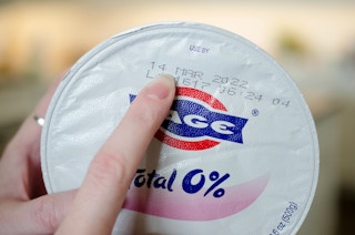Fage Total greek yogurt expiration date finger pointing