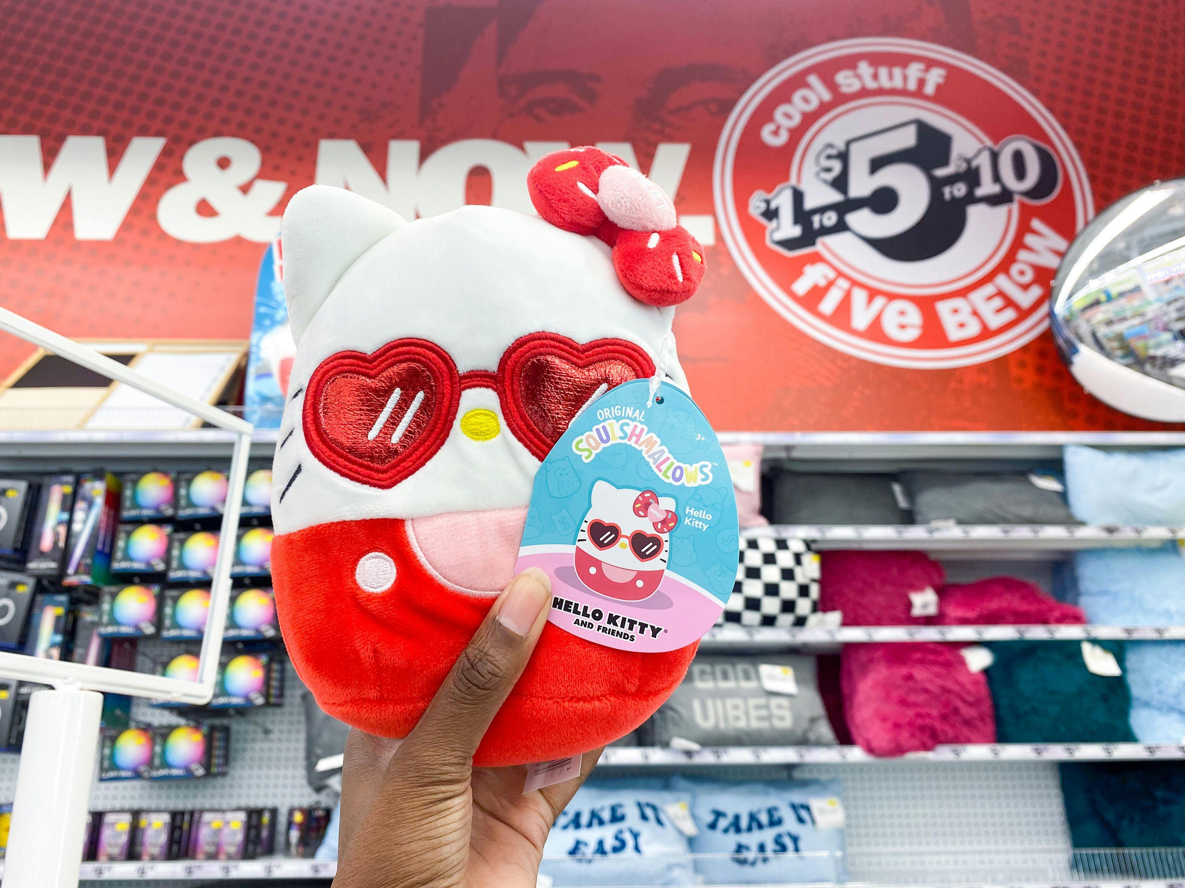 Hello Kitty Squishmallow held in a hand