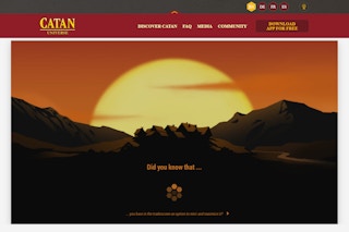 Catan Universe online game with a sunset behind a mountain range.