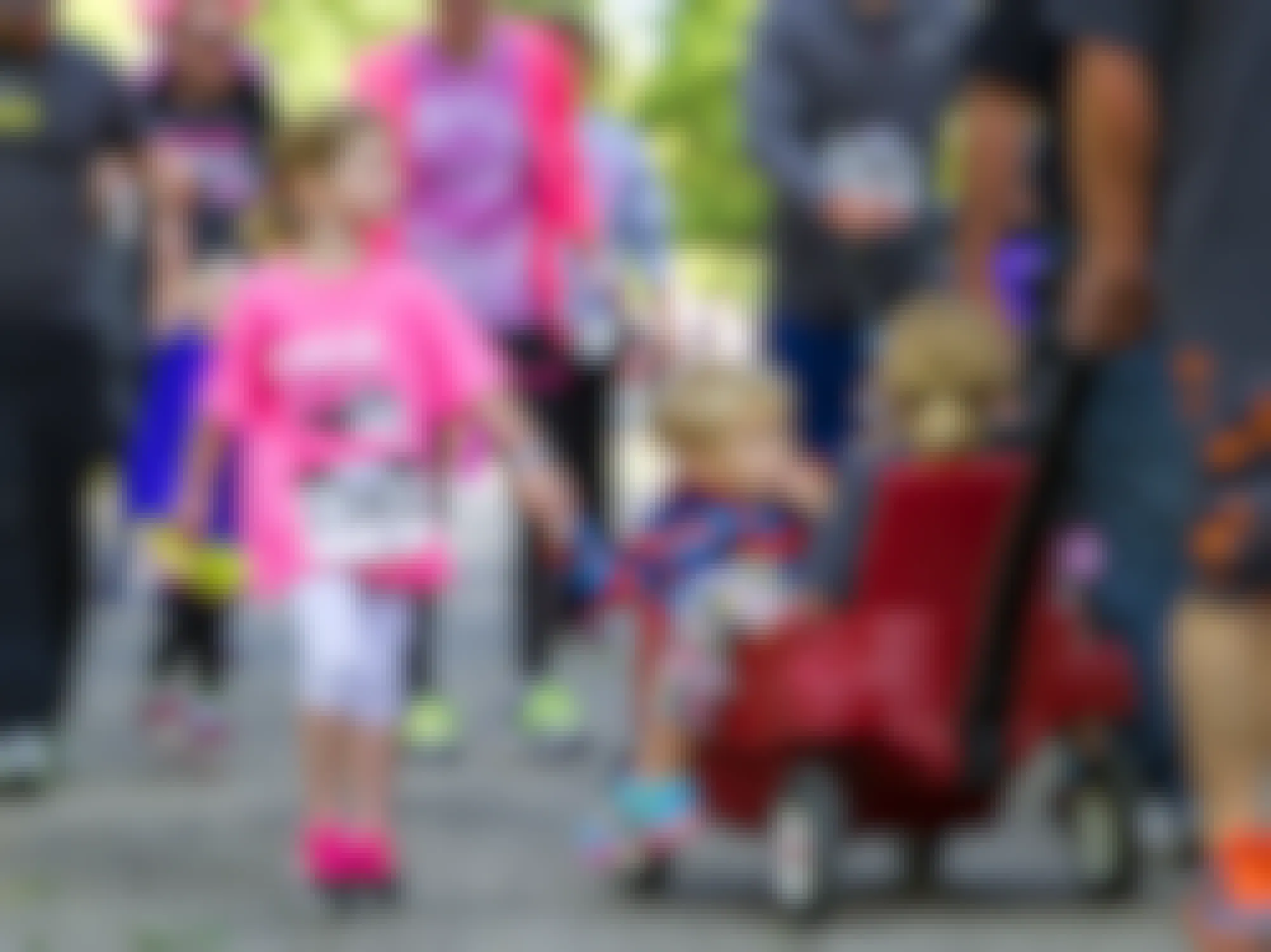 family walking together in 5K charity event