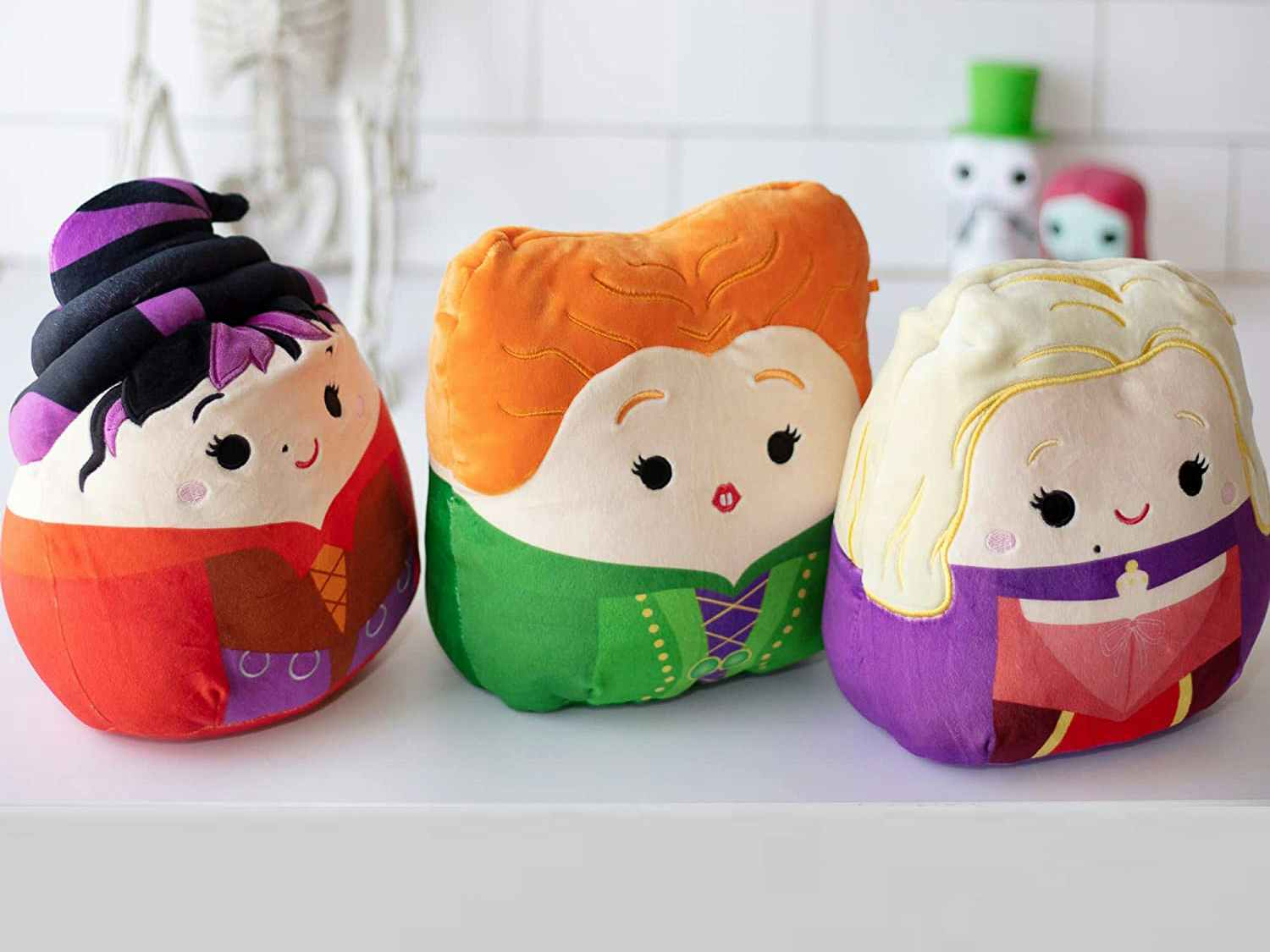 The Hocus Pocus Sanderson Sisters three piece Squishmallow set staged on a counter.