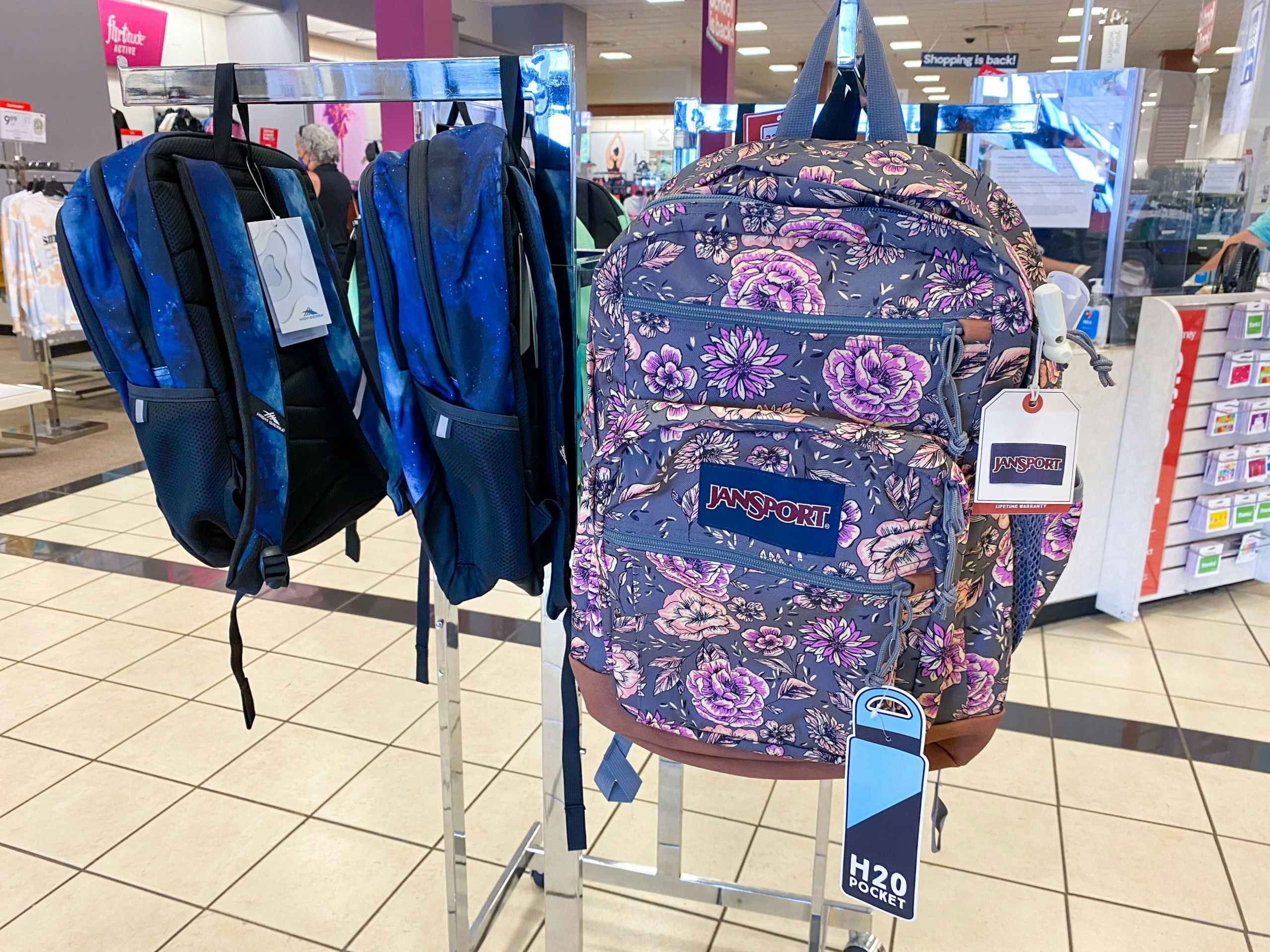 jansport backpacks on display